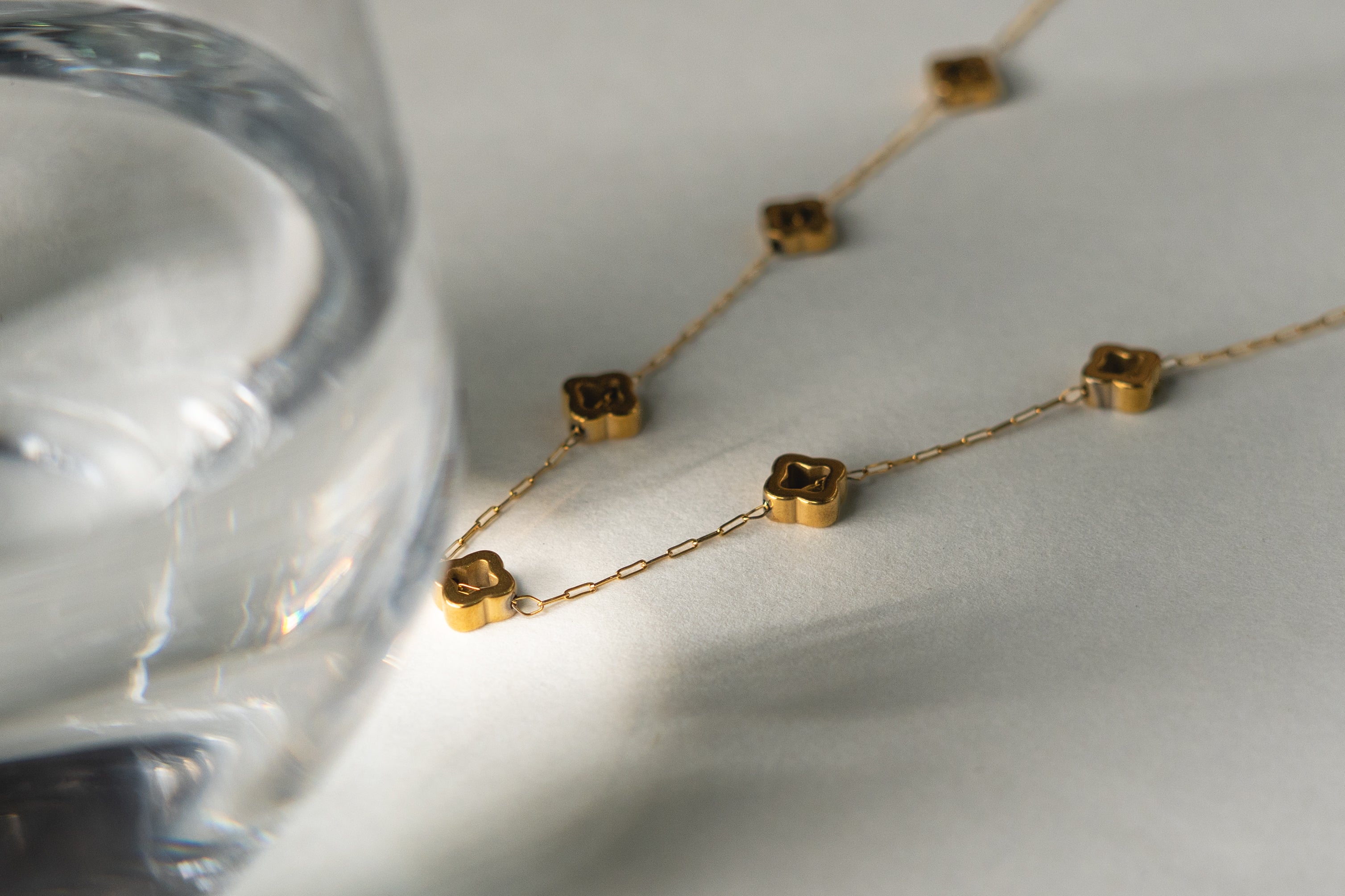 Delicate Gold Clover Charm Necklace